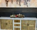 The beauty is in the detail of this stunning sideboard. Handcrafted from solid wood, it has lots of space to display pictures of your loved ones on top, set your television, or display your table top décor. Ample space to store items with the three drawers and two cabinets.

DIMENSIONS:100"L x 36"H x 17"D