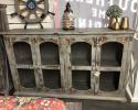 The four door wire mesh console is a perfect accent piece for your home. Made from solid wood.