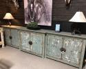 Dimensions: 138"L x 35"H x 20"W

Heavily distressed 6 door cabinet , handcrafted from solid wood and adorned with rustic iron hardware.

Behind each set of a doors is a shelf. The possibilities are endless on what you can store behind the doors.