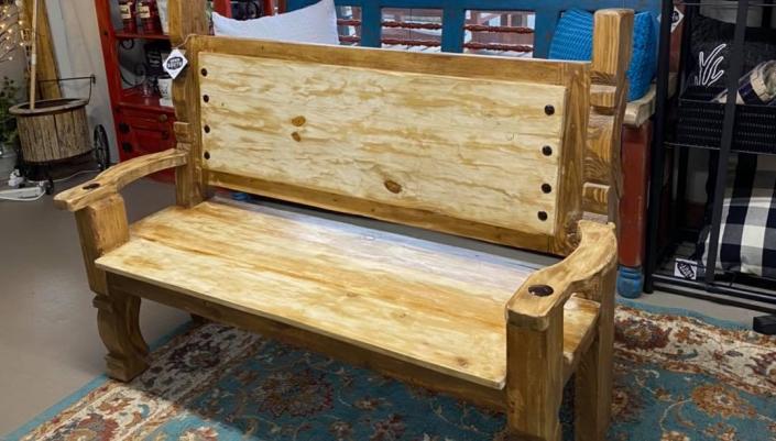 Handcrafted bench painted in a cream color then distressed to give that rustic feel.