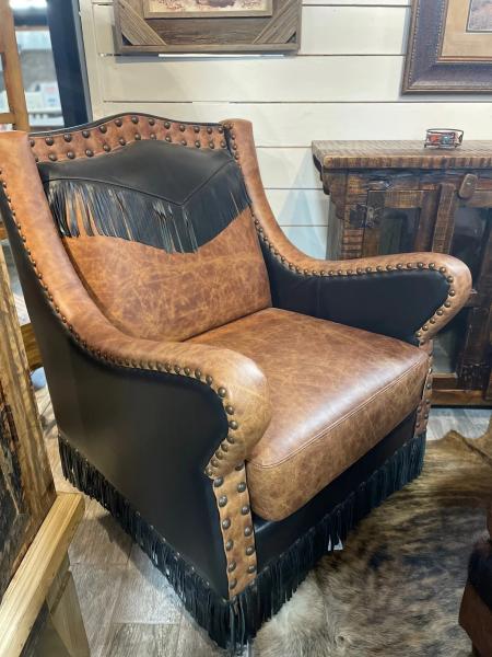Customize this beauty with your pick of over 30 different leather options, as well as hair-on-hide and tooling!
