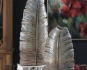 Textured, distressed ceramic leaf vases finished in a pale blue, ivory and bronze glaze. Due to the nature of fired glazes on ceramic
