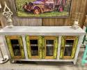 This rustic sideboard has 4 doors with old iron hardware, 4 doors with glass inserts. There is 2 shelves behind the doors to display your treasures.
Dimensions: 69"L x 15"D x 36"H