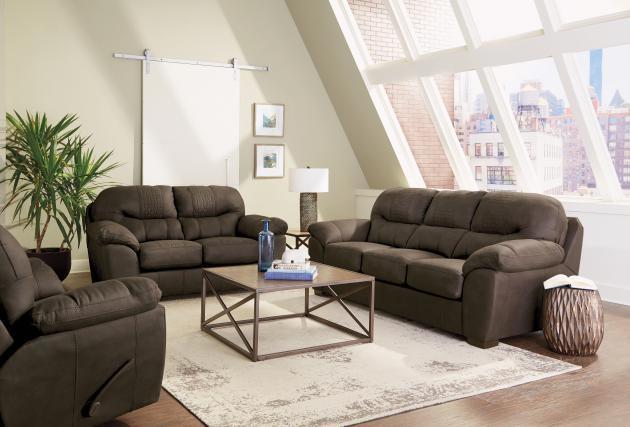 Sit back and relax in this casual contemporary faux leather Living room set.