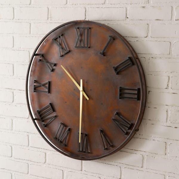 Mixed Metal Wall Clock is made out of metal and hangs with one keyhole hanger. It uses one AA battery (not included).
24'' dia. x 2''D