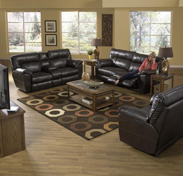 Nolan Couch Set: Whats better than a comfy couch? A comfy couch that also reclines! The Nolan set is fantastic for all your occasions!  Its dark leather upholstery is a beautiful accent to any southern home.  Call for more details and to check availability.