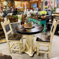 Round Pedestal table with two chairs