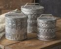Set of 3 metal canisters with lids. Use only with wrapped food or use to store small items. These items nest for easy shipping and storage.
Large: 7½" dia. x 9"H, Medium: 7" dia. x 8"H, Small: 6" dia. x 7¾"H.